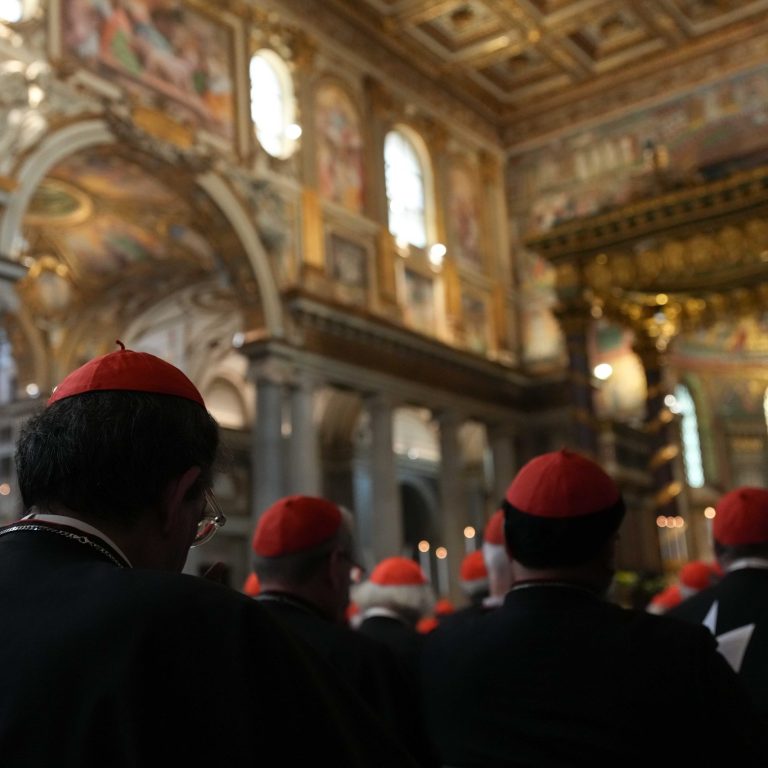 Members of the College of Cardinals attend vespers at the Basilica of St. Mary Major in Rome April 27, 2025, and pray at the tomb of Pope Francis. (CNS photo/Lola Gomez)