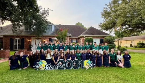 Holy Savior Menard 7th Grade class gather for breakfast before heading to classes on the first day of the 2025-2026 school year.