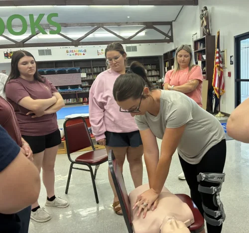 Sacred Heart School faculty receive CPR training the week before classes begin. 