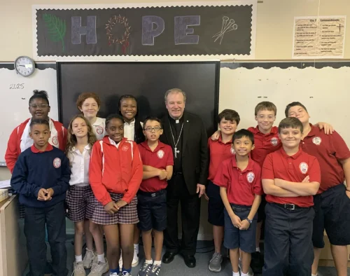 Bishop Robert Marshall visits classrooms at St. Frances Cabrini School.