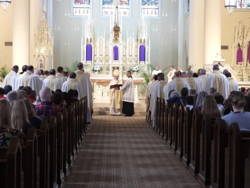 Priests renew their vows.