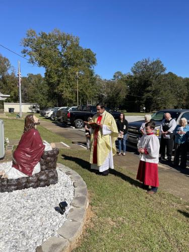 Fr. Bino blesses a statue at Sts. Francis and Anne Church in Kolin