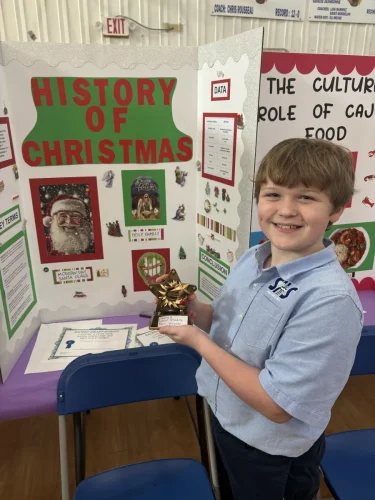  1st place and overall winner in the 2026 Catholic School Week Social Studies Fair. The project was the "History of Christmas."