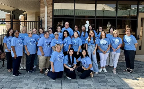 Sacred Heart School staff and faculty attend the Back-to-School Mass celebrated by Bishop Robert Marshall at St. Rita Church.