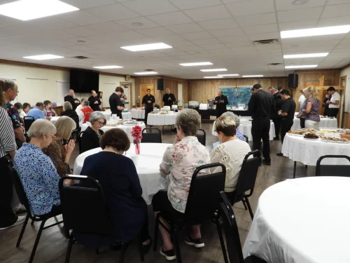 Bishop says a prayer and blessing to start the event. Desserts with the Seminarians held at Maryhill on Thursday, July 23. 