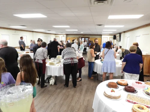 Crowd digging into desserts during Desserts with the Seminarians held at Maryhill on Thursday, July 23. 